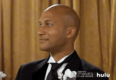 Man trying not to laugh